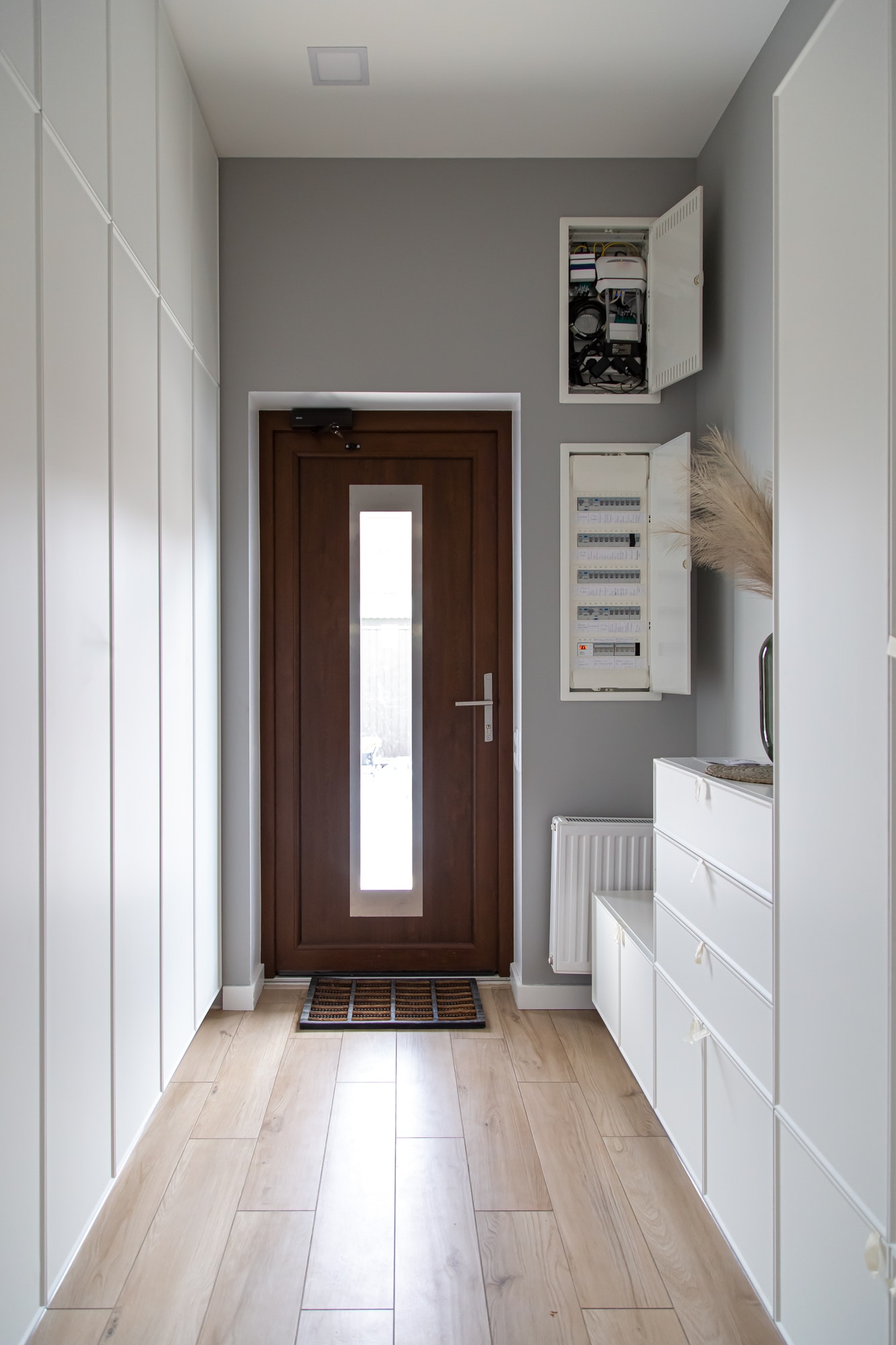 Corridor interior with an entrance door in a private house.